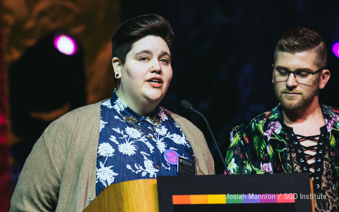 Roze R.B. Brooks (left) and Justin Drwencke (right) address MBLGTACC attendees in Omaha